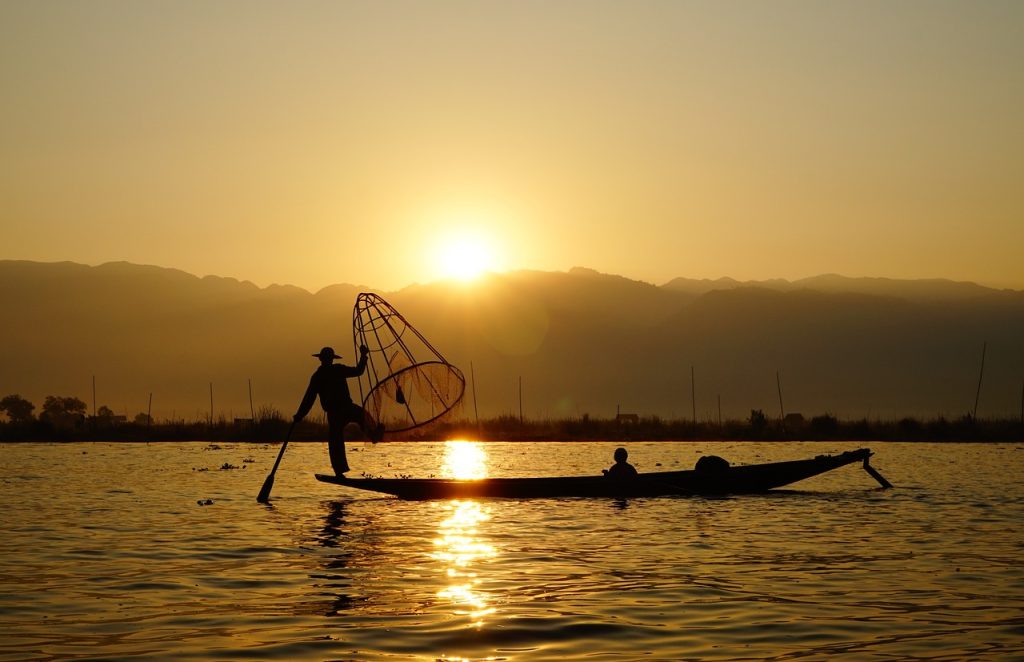 Photo by Mulpat lake, fisherman, boat