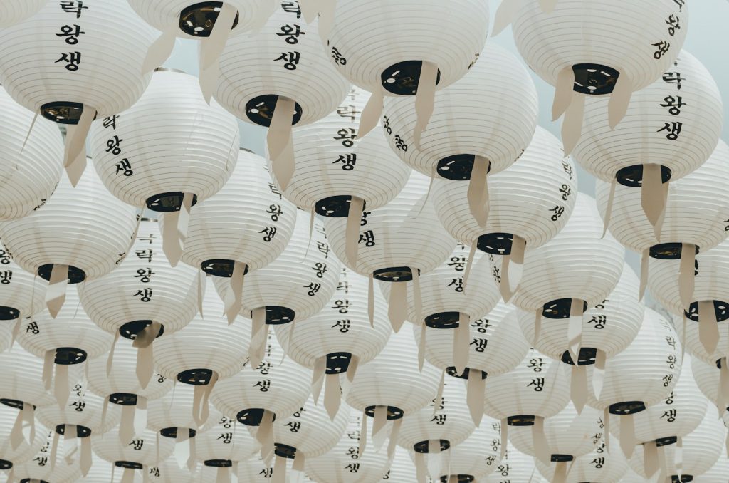 Photo by Valery Rabchenyuk white-and-black paper lanterns during daytime