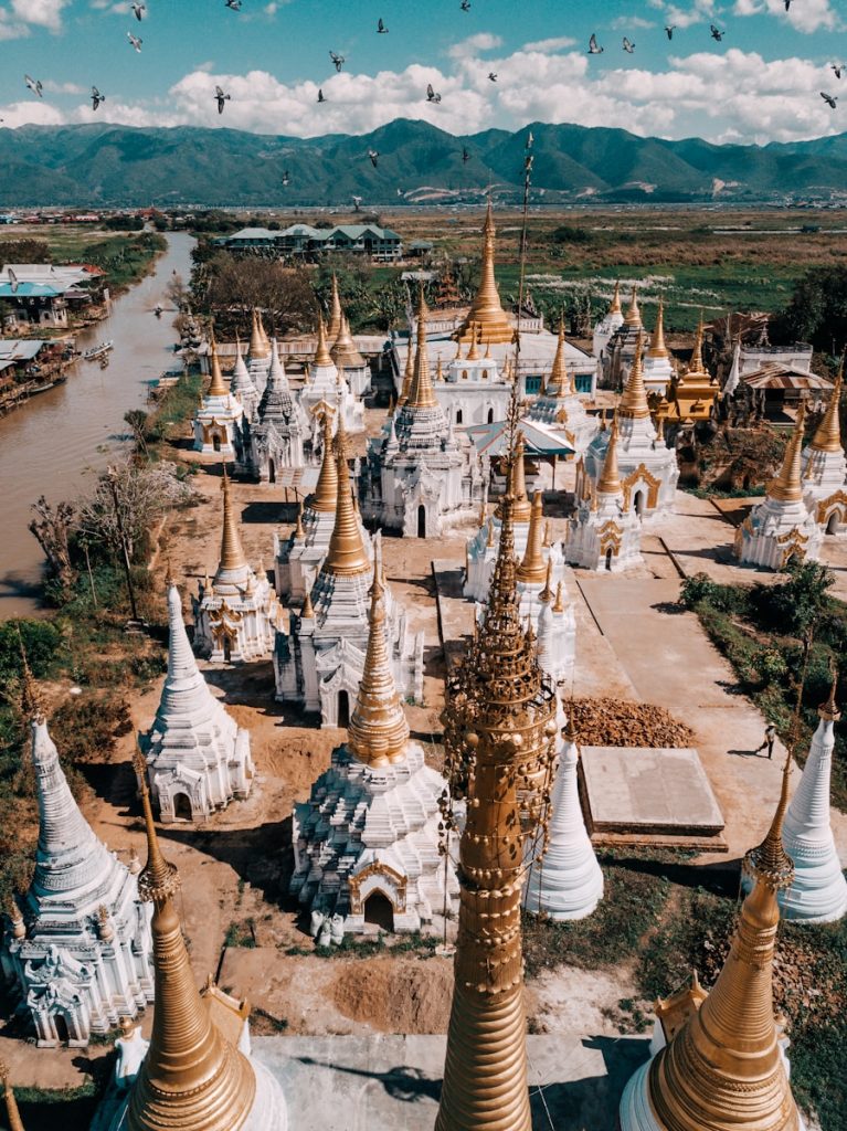 Photo by Alexey Komissarov A large group of white and gold buildings