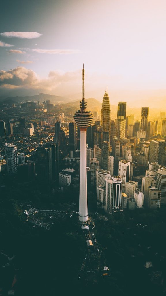 Photo by Izuddin Helmi Adnan CN tower during golden hour